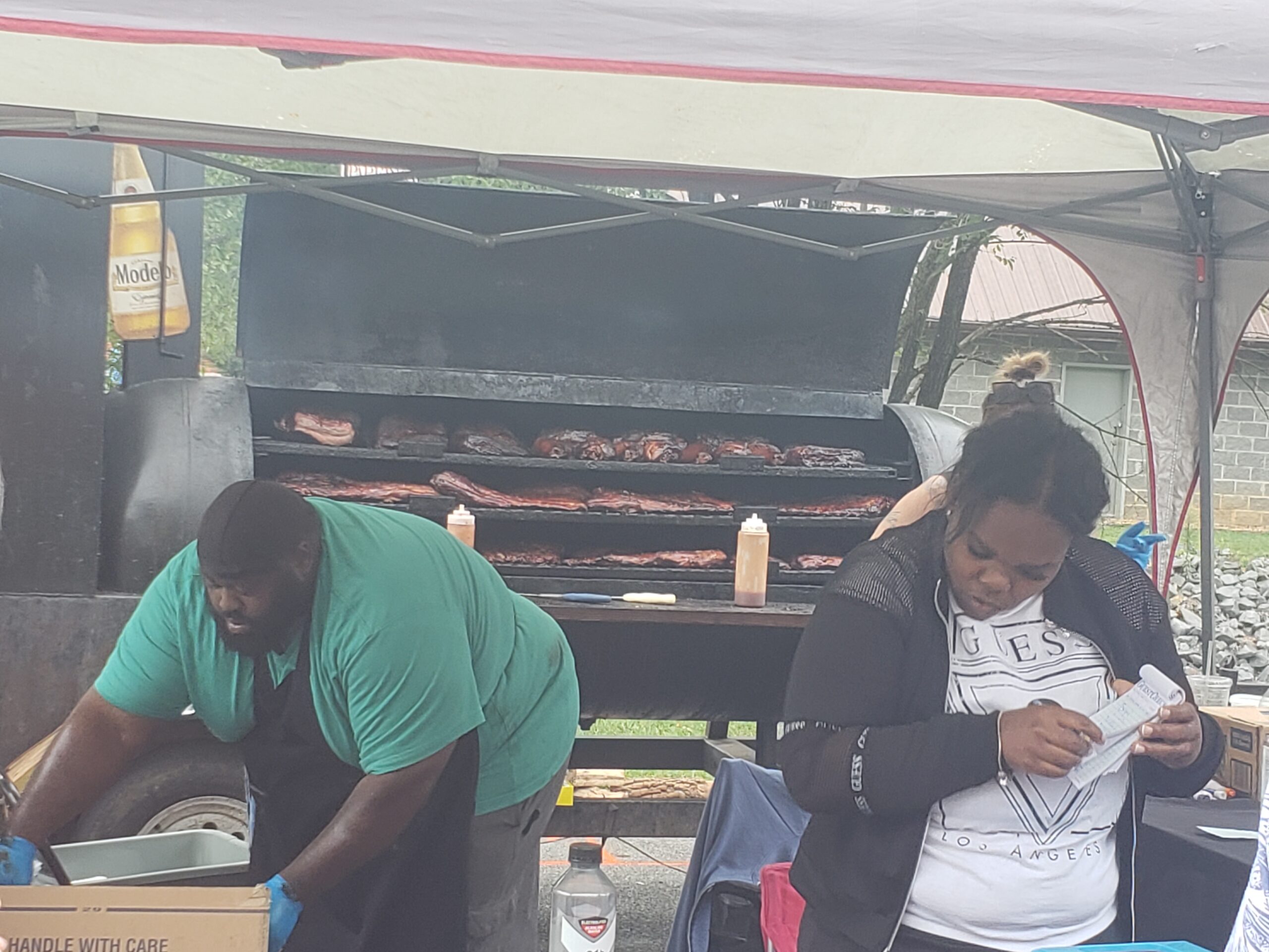 People Cooking BBQ at Blues and BBQ Event